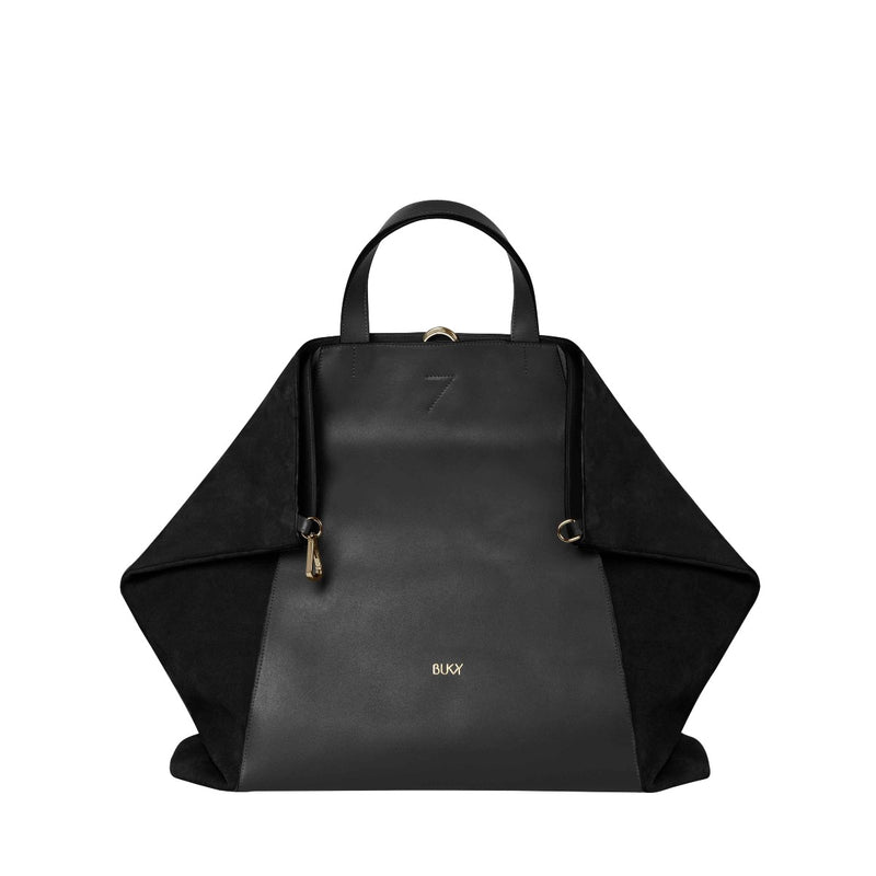 Women's leather maxi bag in black leather. A backpack, handbag and shoulder bag all in one. The best professional work bag, multifunctional bags and accessories for women. 
